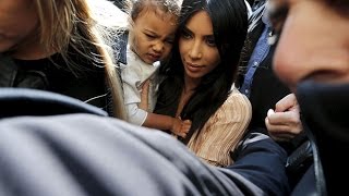 North West baptism Kim Kardashian and Kanye West mobbed in Israel [upl. by Pergrim]