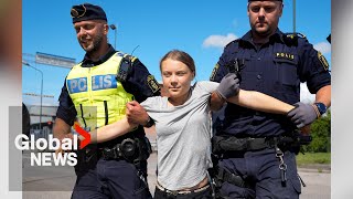 Greta Thunberg forcibly removed by police at climate protest — again [upl. by Gilford18]