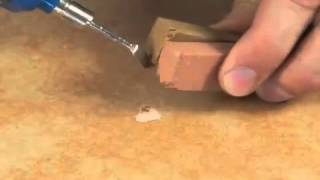 How to repair a hole or chip in a tile [upl. by Doggett]