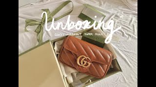 Unboxing  New Gucci Marmont Matelassé Super Mini Bag in Brown Leather [upl. by Diarmit]