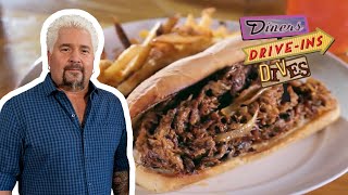 Guy Fieri Eats the ThreeMeat Octavian Sandwich  Diners DriveIns and Dives  Food Network [upl. by Aticnemrac]