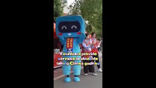 Volunteers provide services during gaokao in Chinas Shenyang [upl. by Ligetti]