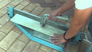 How to Cut Porcelain Tiles With a Tile Cutter [upl. by Nimar899]