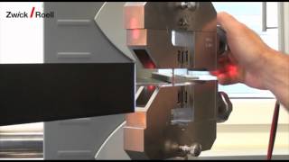 Tensile testing on micro dumbbells  Zugversuch an Miniaturschulterproben [upl. by Poulter]