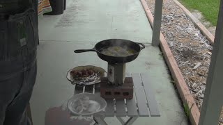 Homemade wood gas stove cooks bacon and eggs [upl. by Aneekan]