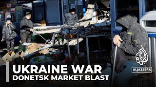 Russia says at least 25 killed in blast at Donetsk market [upl. by Kcirtapnaes]