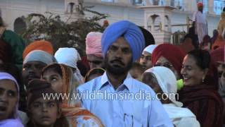 Devotees gather to pay obeisance at the Sikh shrine Golden Temple Punjab [upl. by Doran]