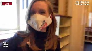 WATCH Lisa Desjardins reports from inside US Capitol where proTrump mob interrupts vote count [upl. by Bekah]