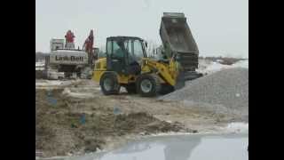 Wacker Neuson WL50 backfilling gravel avi [upl. by Lurlene585]