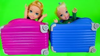 Elsa and Anna toddlers buy suitcases to go on holidays [upl. by Enaz]