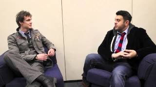 Inside the Expedia Travel Lounge Adam Richman from the Travel Channel [upl. by Ahsikel]