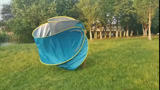 How to fold up a pop up beach tent [upl. by Eldoria]