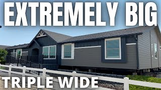 GIGANTIC triple wide mobile home with literally EVERYTHING Prefab House Tour [upl. by Hterag]