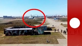 Video Ukrainian pilots escape with aircraft as troops take over air base [upl. by Novello]