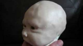 sculpting a clay baby head by Phils Clay Babies better known as Philsooakbabies [upl. by Ezitram189]