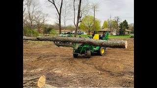 EASY LAND CLEARING WITH THE JOHN DEERE 1025R AND THE FRONTIER AV20F ROOT GRAPPLE [upl. by Mclaughlin889]