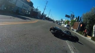 WATCH Driver Knocks Man Off Motorcycle In Road Rage [upl. by Anglim]