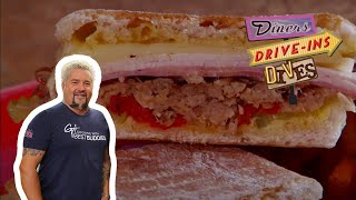 Guy Fieri Eats a CubanStyle Sandwich at the Pit Stop  Diners DriveIns and Dives  Food Network [upl. by Trevorr]