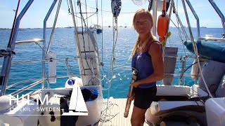 Installing the rudder and changing propeller shaft sealing in the water Ep 47 Hilma Sailing [upl. by Amalbergas52]