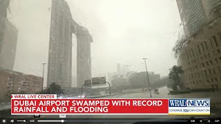 Storm dumps heaviest rain ever recorded in desert nation of UAE flooding roads and Dubais airport [upl. by Annait765]