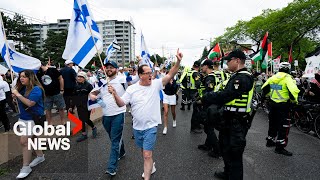 Toronto quotWalk with Israelquot march confronted by proPalestinian protesters [upl. by Ogdon661]