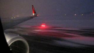 Boeing 737800W taking off in snowstorm EKCH [upl. by Anaerb]