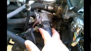 How to replace a Thermostat on a Honda Civic engine [upl. by Ikin573]