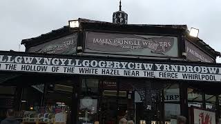 Llanfairpwllgwyngyllgogerychwyrndrobwllllantysiliogogogoch train station with longest name in Wales [upl. by Placidia]