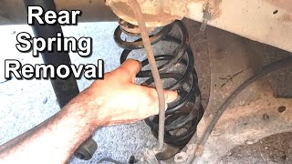 How to Replace a Rear Coil Spring [upl. by Care]