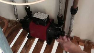 How to fit or replace a shower pump  Plumbing Tips [upl. by Nomyt]