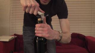 5 How to Open a Bottle of Wine with a Waiters Corkscrew  SuppleWinecom [upl. by Gefen236]