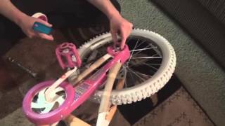 How to assemble a kids bike and training wheels [upl. by Trude]