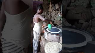 Making injera in Ethiopia on improved cookstove [upl. by Nahshunn]