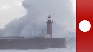 Atlantic storm Huge waves crash into lighthouse in Portugal [upl. by Ladonna]