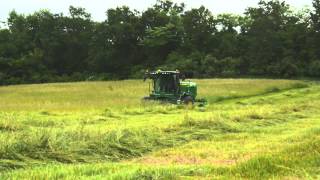 John Deere W235 SelfPropelled Windrower Video [upl. by Logan]