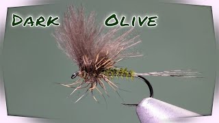 Tying a dark olive dun dry fly pattern with CDC and deers ear  very good flotation [upl. by Ymmak]