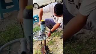 Handheld spiral ground anchor installation drill [upl. by Meehan704]