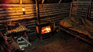 Warm and Cozy Tiny Bushcraft Cabin with Wood Stove – Winter Camping in Rain [upl. by Wilcox]