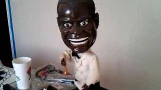 Creepy Louis Armstrong Singing Doll  Low Battery [upl. by Atteram439]