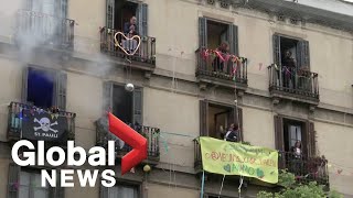 Coronavirus outbreak Neighbours in Barcelona Spain host balcony party amid lockdown [upl. by Ecnatsnok]