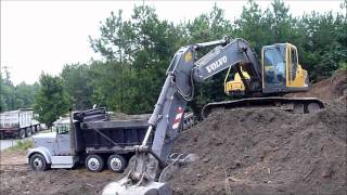 Volvo EC210 Excavator Rocking Out Trucks [upl. by Irma403]