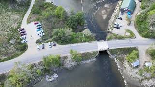 Alewife and Herring migration in Maine Damariscotta Mills Fish Ladder May 13 2023 4K Drone video [upl. by Adnawuj]