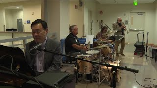 Moffitt Cancer Center band brings joy to staff and patients [upl. by Eceinehs]