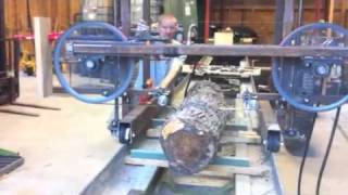 First cut Homemade hydraulic bandsaw mill [upl. by Aidole519]