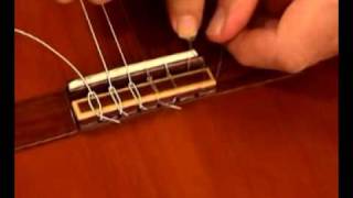 How to change classic guitar strings [upl. by Amees]