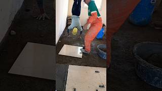 Installing ceramic floor tiles with cement shorts Tileinstallation [upl. by Baxy]