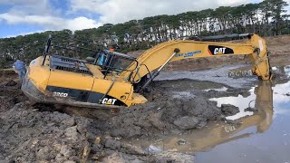 Excavator Bogged Stuck In Mud And Pulled Out with Winch truck [upl. by Lunsford]