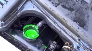 Car Coolant  AntiFreeze Replacement DIY Maintenance on Mazda Familia [upl. by Dorfman]