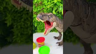 T Rex Knocks Down Play Doh Pyramid dinosaurs [upl. by Mauralia]