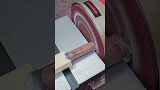 Person is destroying a tube of lip gloss with a sander [upl. by Kanter260]